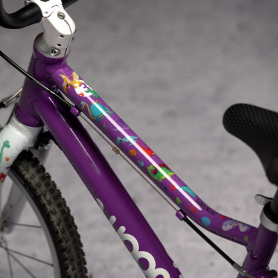 Ochranná fólie na dětské kolo DYEDbro Dinos lesk